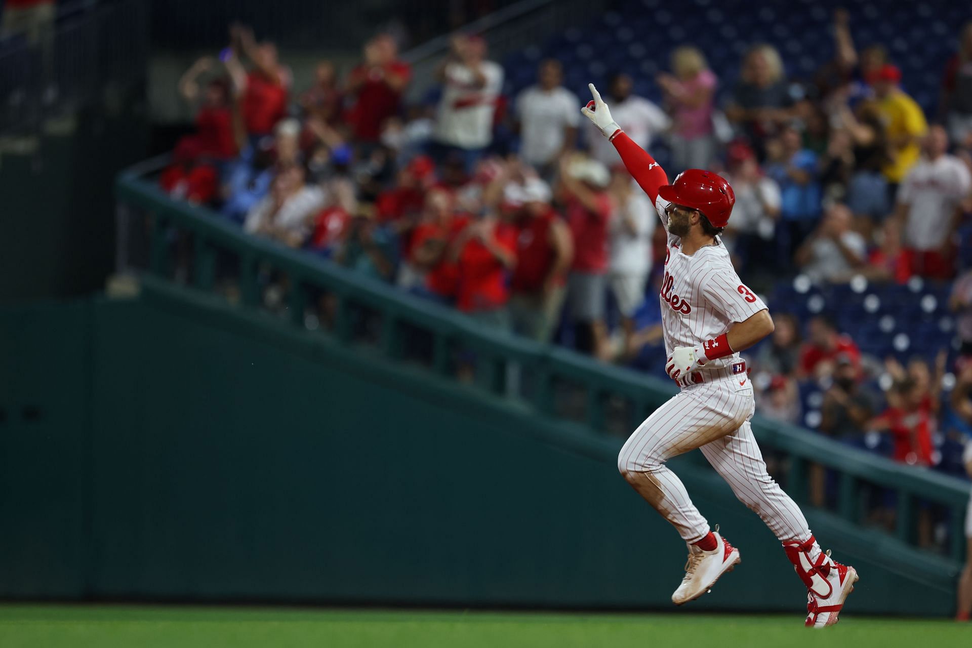 Harper rounding the bases after a home run