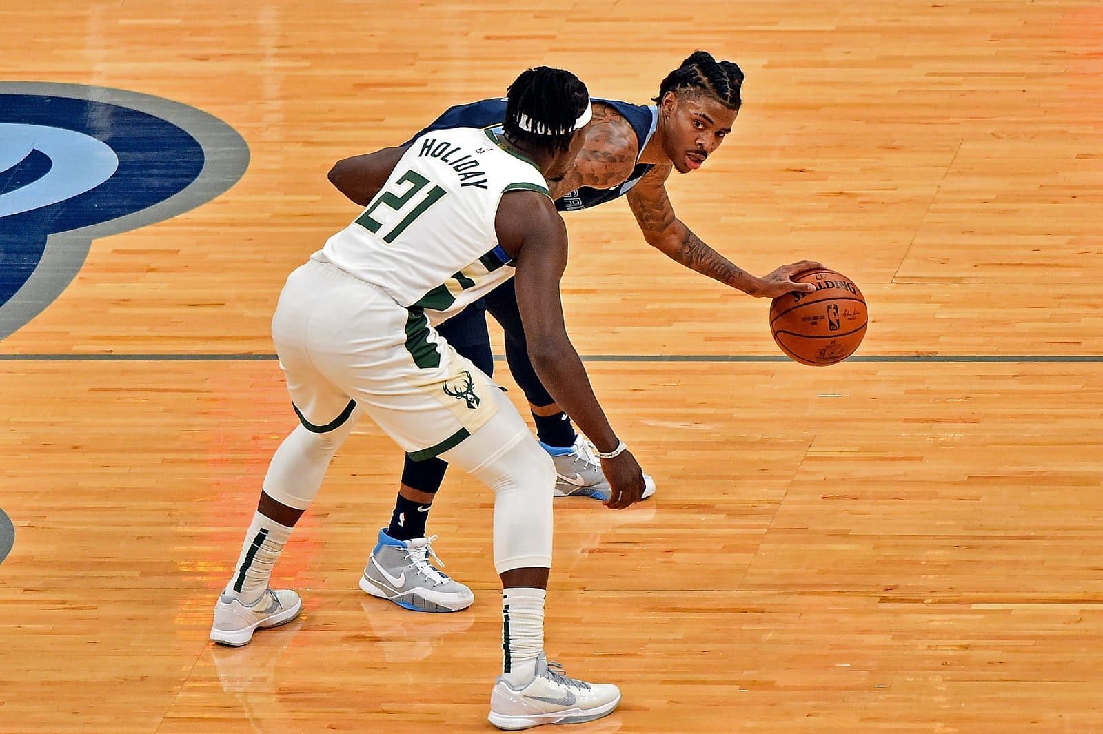Both Jrue Holiday and Ja Morant will be out in tonight&#039;s matchup between the visiting Milwaukee Bucks and Memphis Grizzlies. [Photo: Behind the Buck Pass]