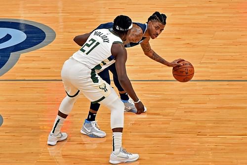 Both Jrue Holiday and Ja Morant will be out in tonight's matchup between the visiting Milwaukee Bucks and Memphis Grizzlies. [Photo: Behind the Buck Pass]