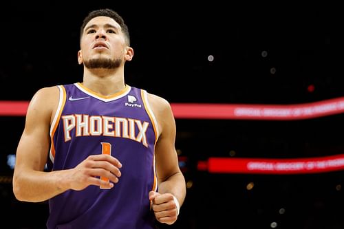 Devin Booker #1 of the Phoenix Suns reacts during the second half of the NBA game against the Houston Rockets at Footprint Center on February 16, 2022 in Phoenix, Arizona. The Suns defeated the Rockets 124-121.