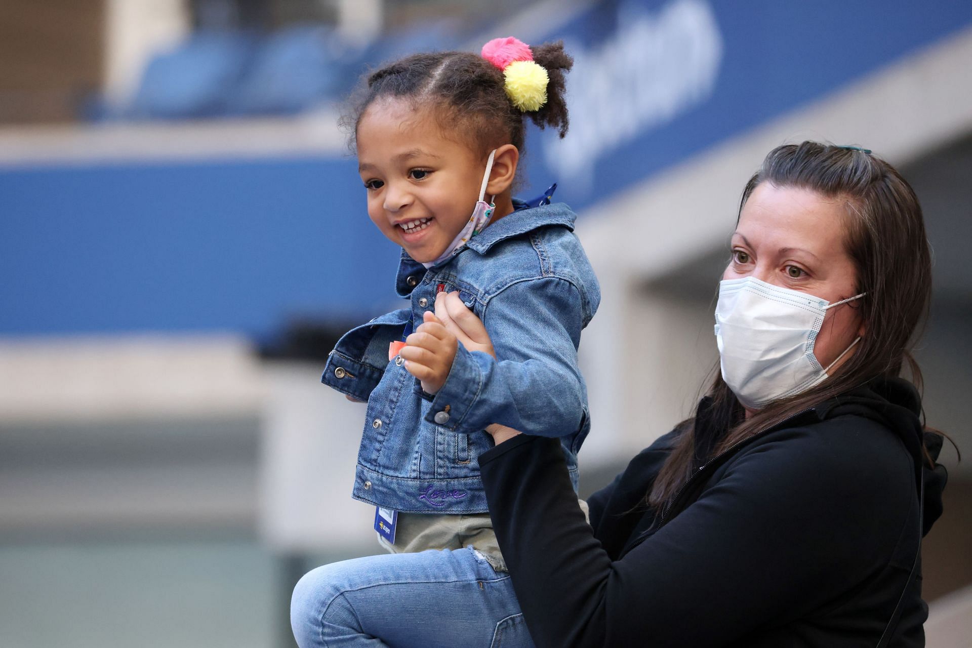 Serena Williams&#039; daughter Olympia cheering from the stands.