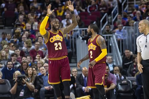 LeBron James #23 of the Cleveland Cavaliers and Kyrie Irving #2 talk after a play during the first half against the New York Knicks at Quicken Loans Arena on February 23, 2017 in Cleveland, Ohio. The Cavaliers defeated the Knicks 119-104.