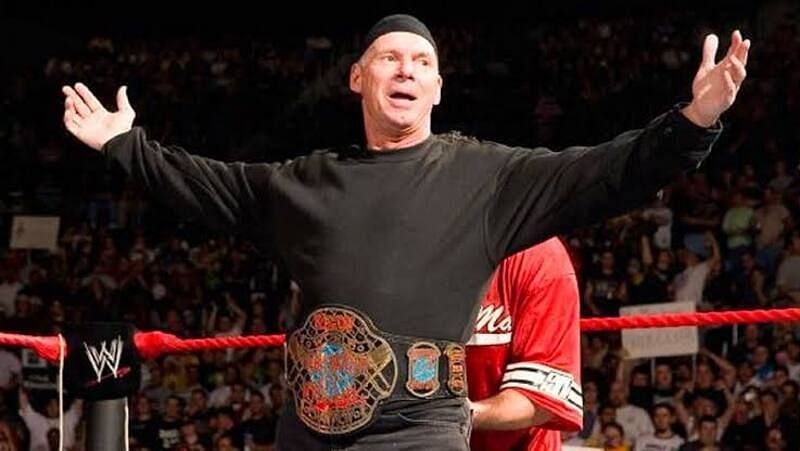 Vince McMahon with the ECW Championship.