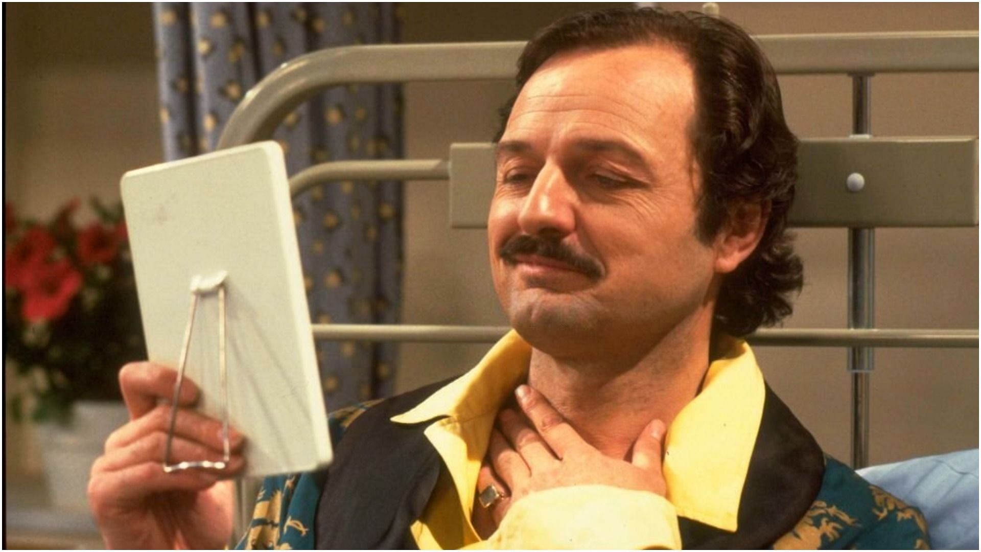 Peter Bowles in character as Archie Glover in sitcom Only When I Laugh (Image via TV Times/Getty Images)