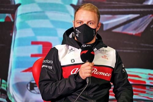 Valtteri Bottas speaks to the media during pre-season testing in Barcelona (Photo by James Bearne - Pool/Getty Images)