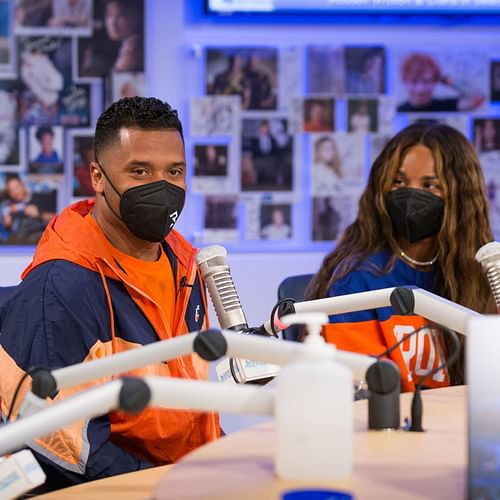 Russell Wilson with his wife, Ciara, at the Children's Hospital in Aurora, CO