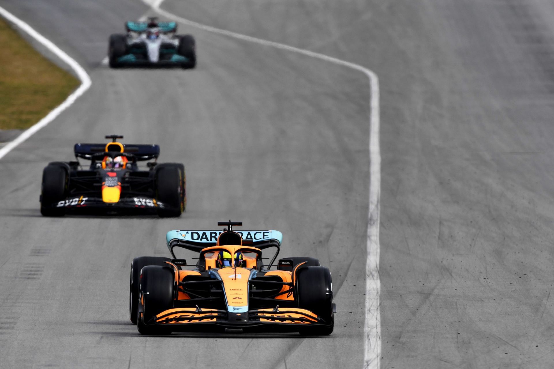 Formula 1 Testing in Barcelona - Day 3 - Lando Norris stays in front of a Red Bull and a Mercedes