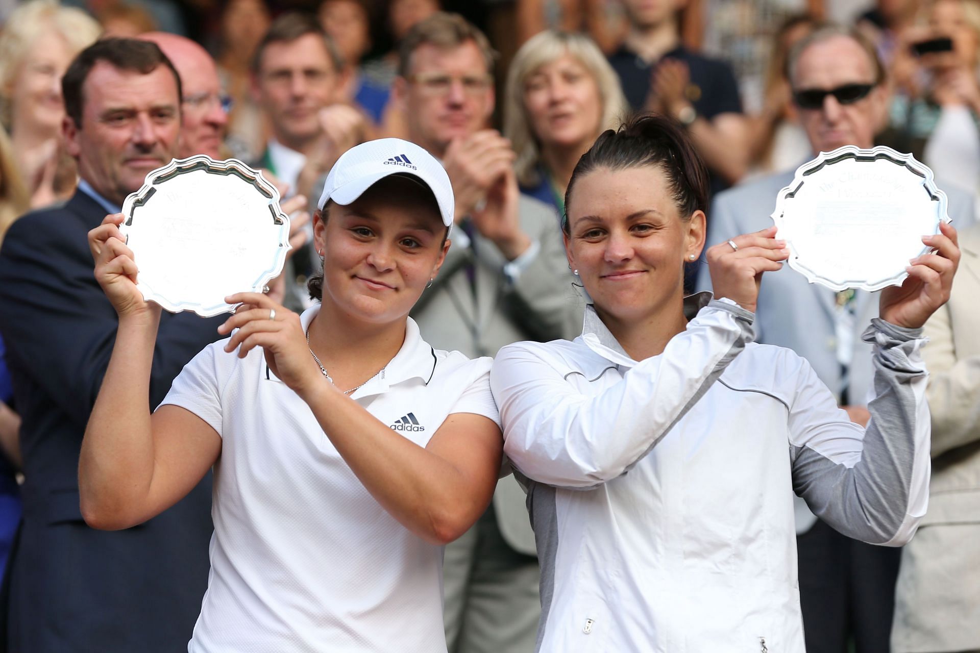 Ashleigh Barty (L) and Casey Dellacqua at the 2013 Wimbledon Championships