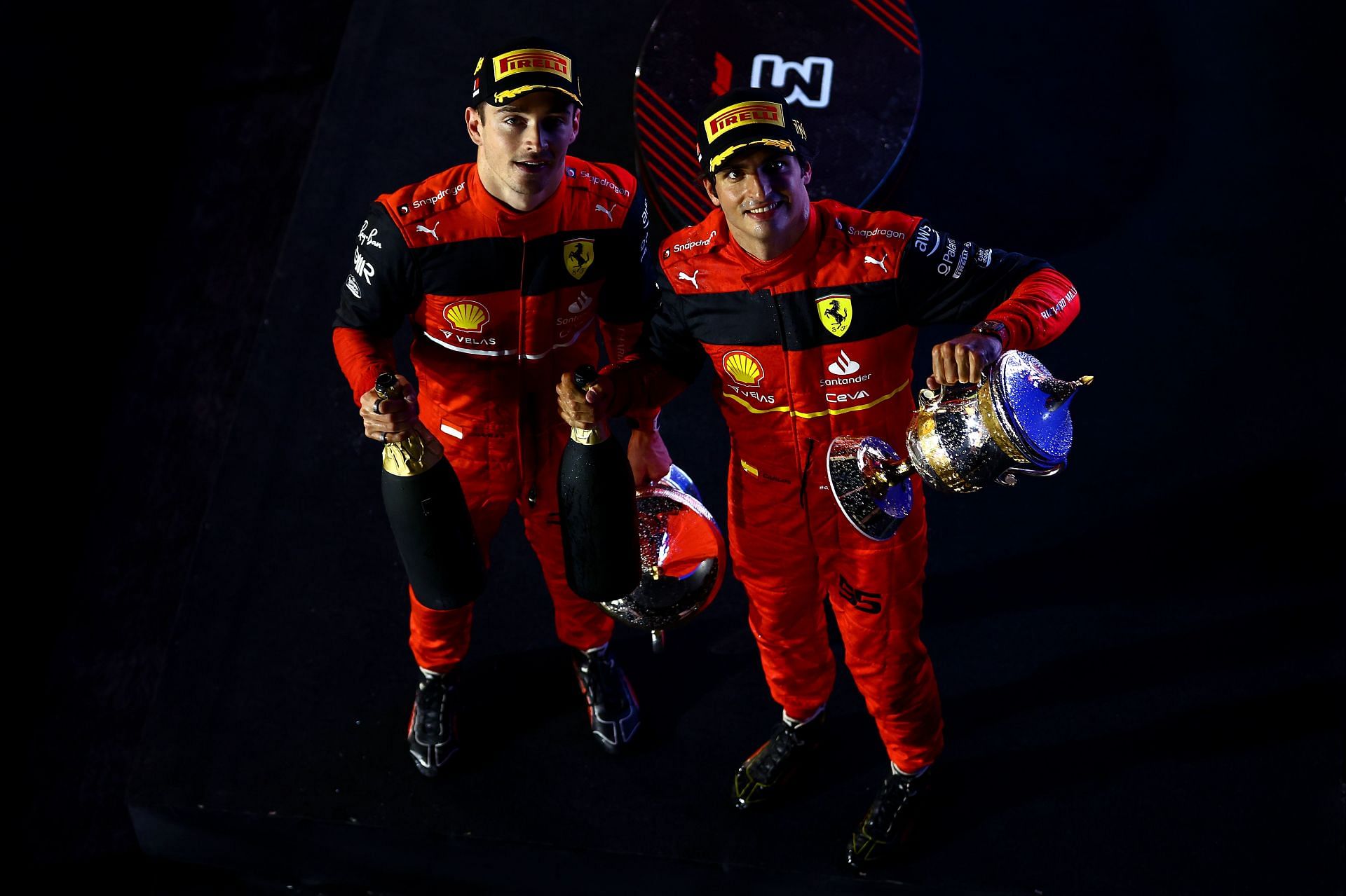 Ferrari&#039;s Charles Leclerc (left) and Carlos Sainz (right) celebrate after the 2022 F1 Bahrain GP (Photo by Mark Thompson/Getty Images)