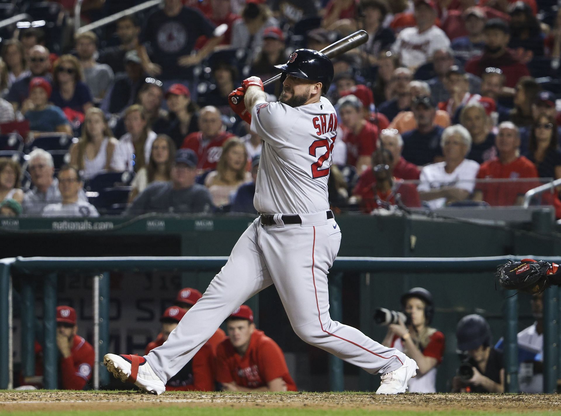 Travis Shaw swings at a pitch during a Boston Red Sox v Washington Nationals game.