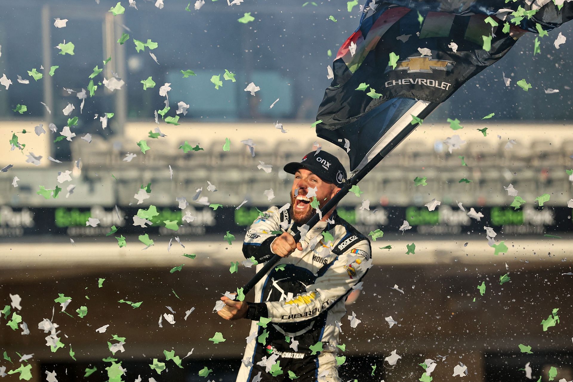 Ross Chastain celebrates in victory lane after winning the NASCAR Cup Series Echopark Automotive Grand Prix.