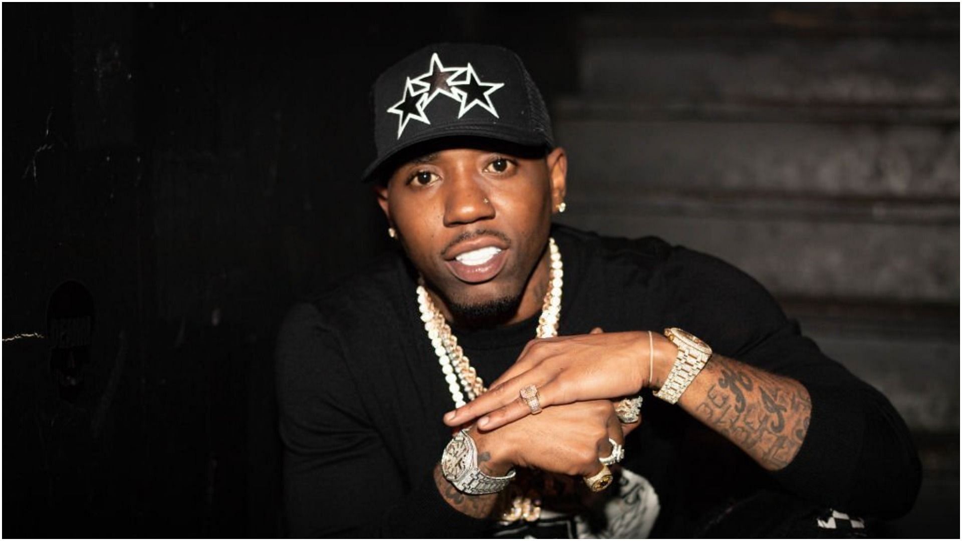 YFN Lucci is desperate to get out of jail after apparently being stabbed inside (Image via Earl Gibson III/Getty Images)
