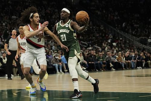 Milwaukee Bucks guard Jrue Holiday drives against the Portland Trail Blazers.