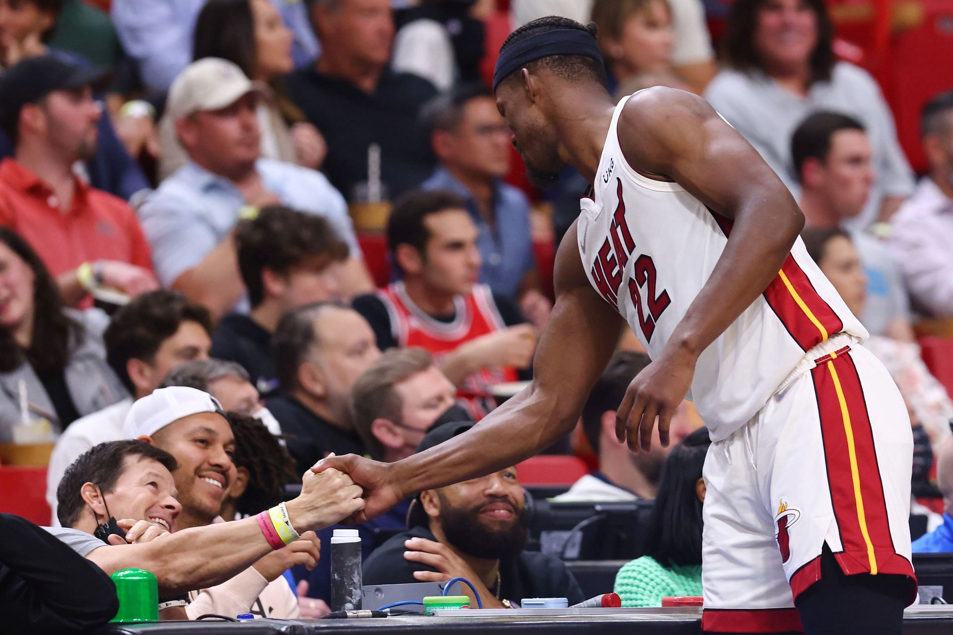 Jimmy &quot;Buckets&quot; Butler of the Miami Heat greets actor Mark Wahlberg