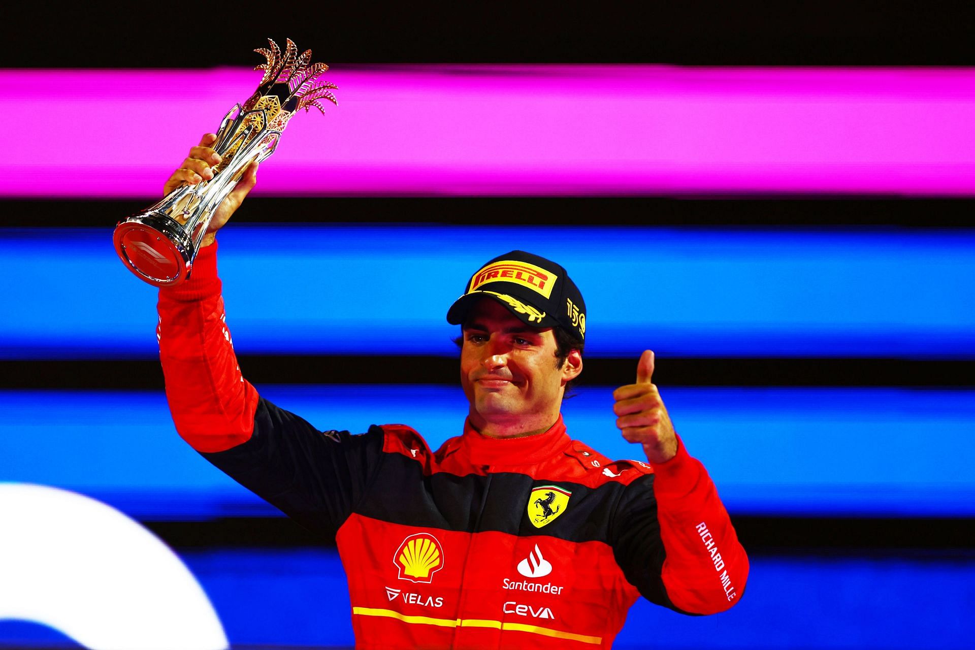 Ferrari&#039;s Carlos Sainz celebrates his P3 finish on the podium of the 2022 F1 Saudi Arabian GP (Photo by Mark Thompson/Getty Images)