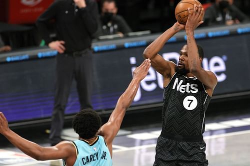 Kevin Durant was content to play back-up to Kyrie Irving in the Brooklyn Nets' win over the Charlotte Hornets. [Photo: NetsDaily]