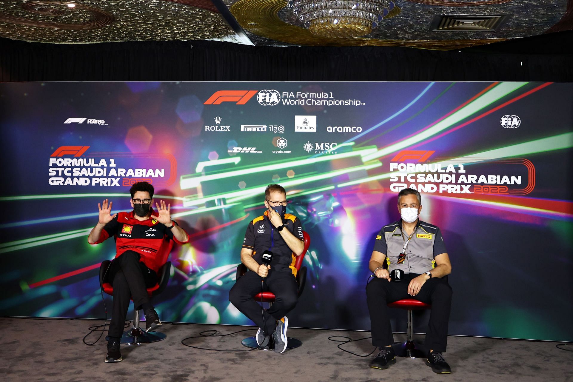 Ferrari boss Mattia Binotto (left), McLaren boss Andreas Seidl (center), and Pirelli boss Mario Isola (right) during the pre-race press conference in Saudi Arabia (Photo by Lars Baron/Getty Images)