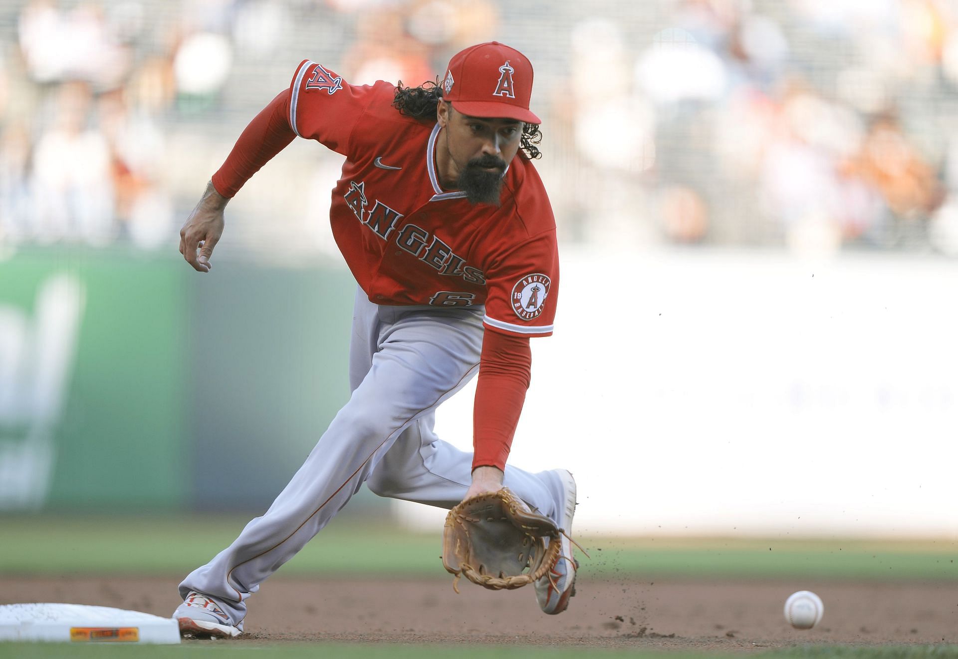 Anthony Rendon fields a ground ball off the bat of Austin Slater