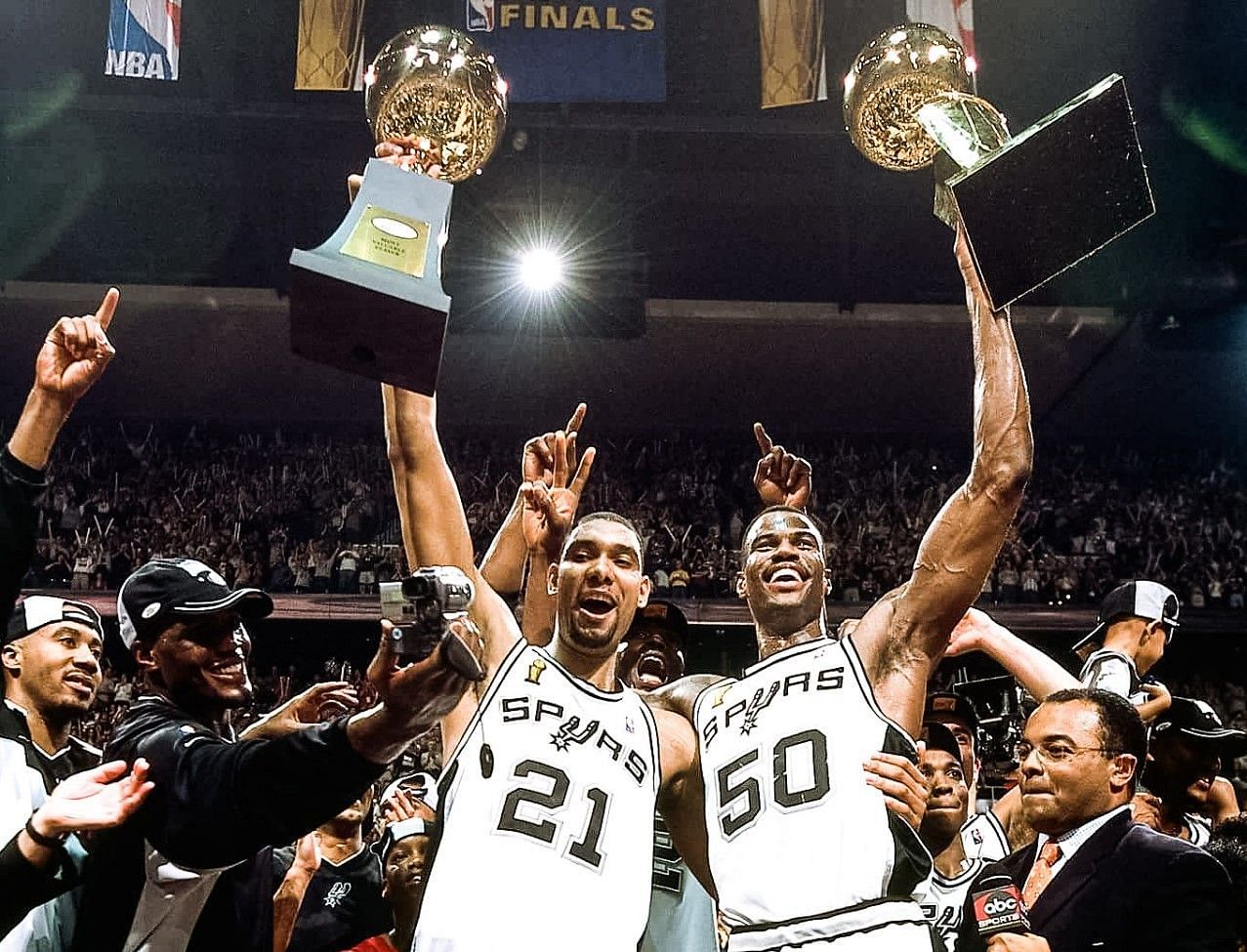 Tim Duncan, left, and David Robinson after winning the 2003 NBA title