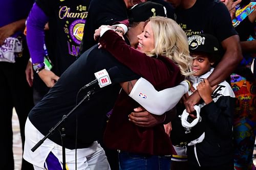 Team owner Jeanie Buss and LA Lakers franchise player LeBron James share a hug during the team's 2020 championship celebration [Photo: OpenCourt Basketball]