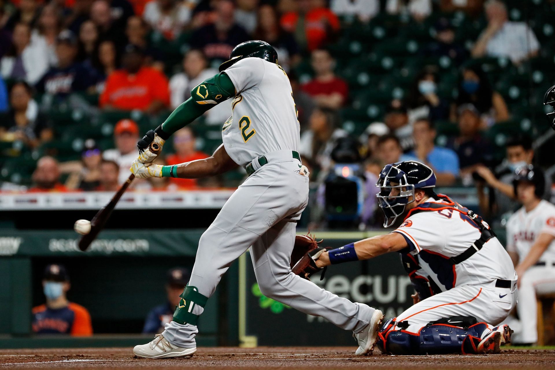 Starling Marte makes contact with a pitch during a Oakland Athletics v Houston Astros game.
