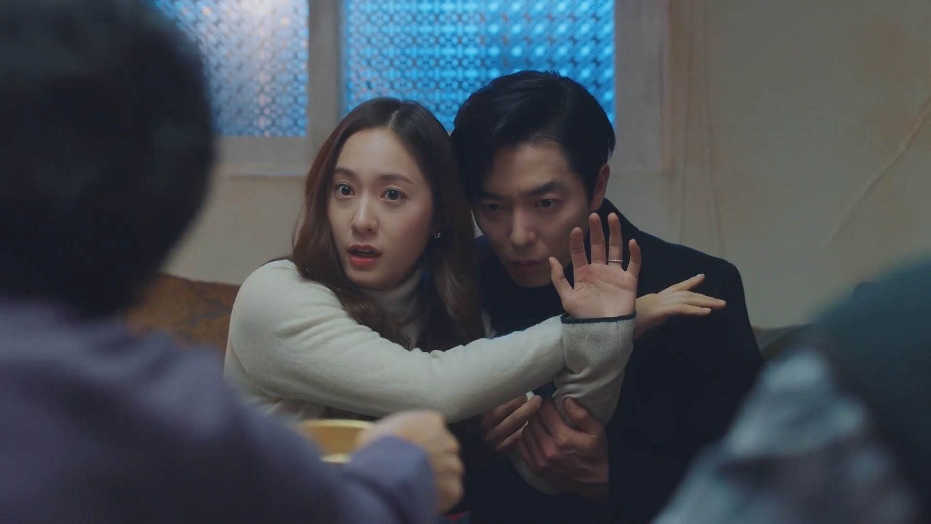 Shin-ah saves Go-jin from her overly-affectionate community (Image via KBS)