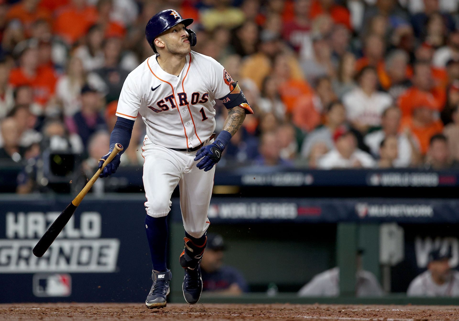 Carlos Correa hits a single against the Atlanta Braves