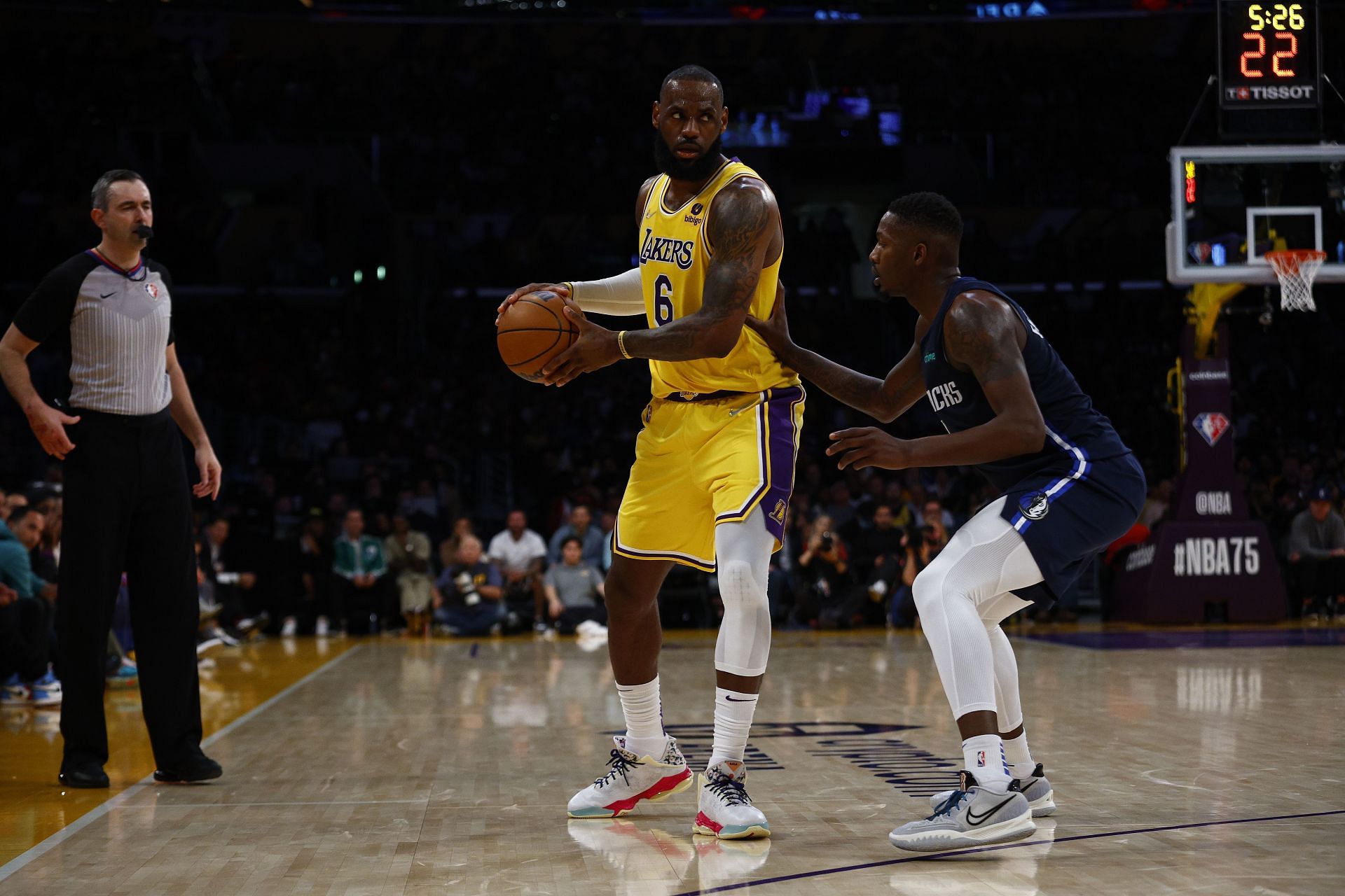 LA Lakers forward LeBron James handles the ball against the Dallas Mavericks.