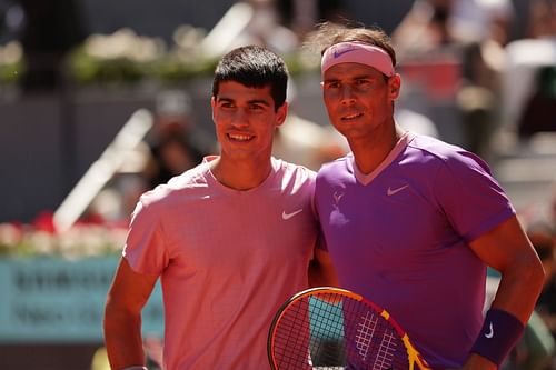 Carlos Alcaraz (L) and Rafael Nadal at the 2021 Madrid Open.