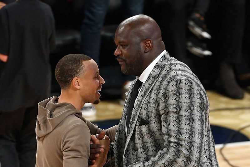 Shaquille O&#039;Neal, right, with Stephen Curry of the Golden State Warriors