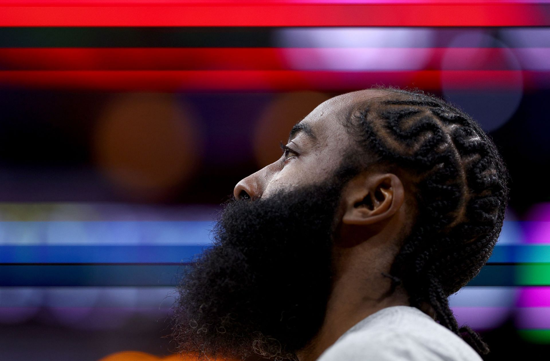 James Harden warms up before the 76ers-Nets game.