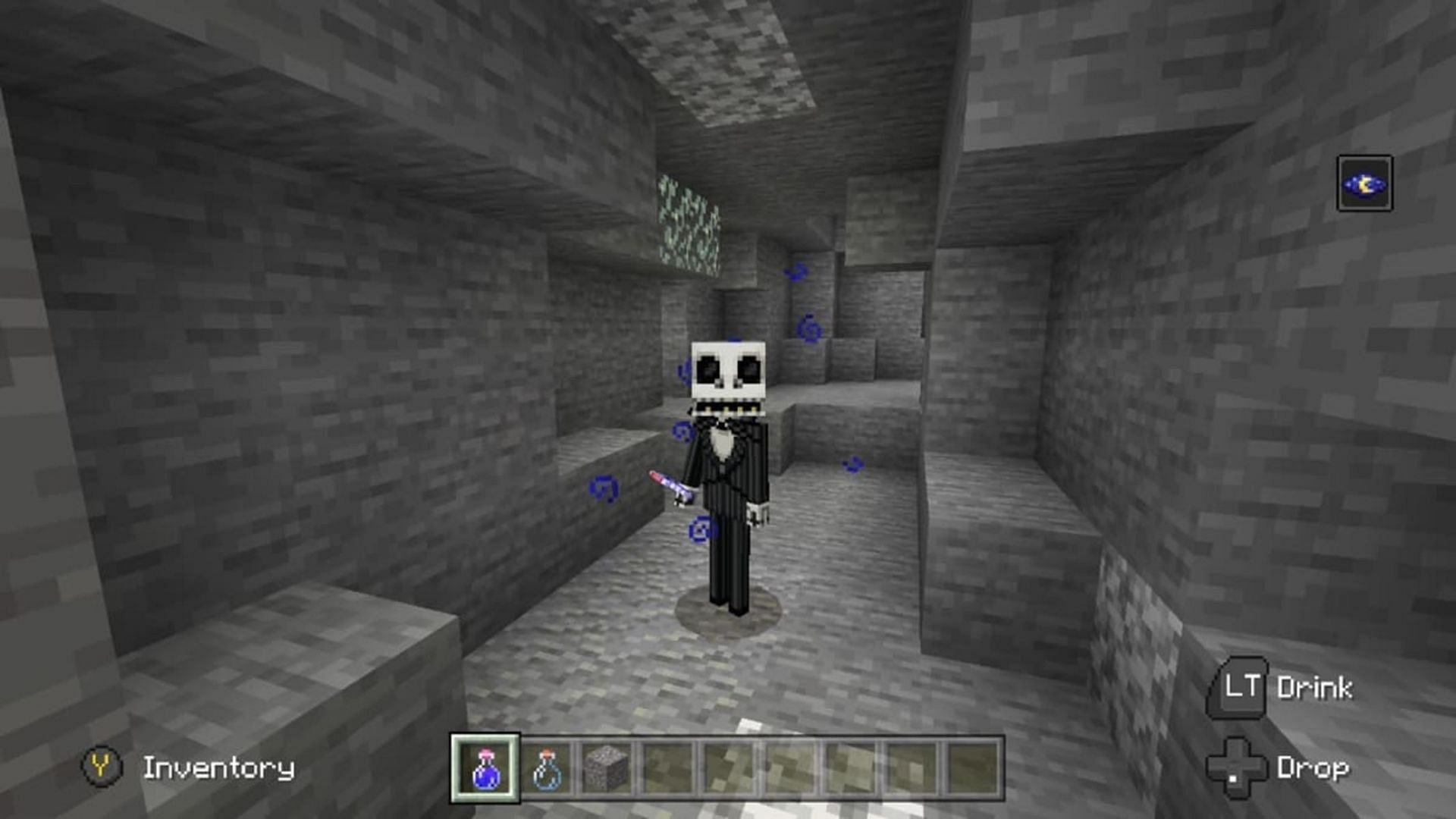 A player is bestowed night vision, allowing them to see inside a dark cave (Image via Mojang)