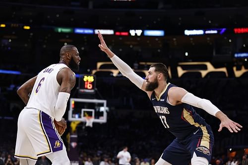 LeBron James, left, and Jonas Valančiūnas