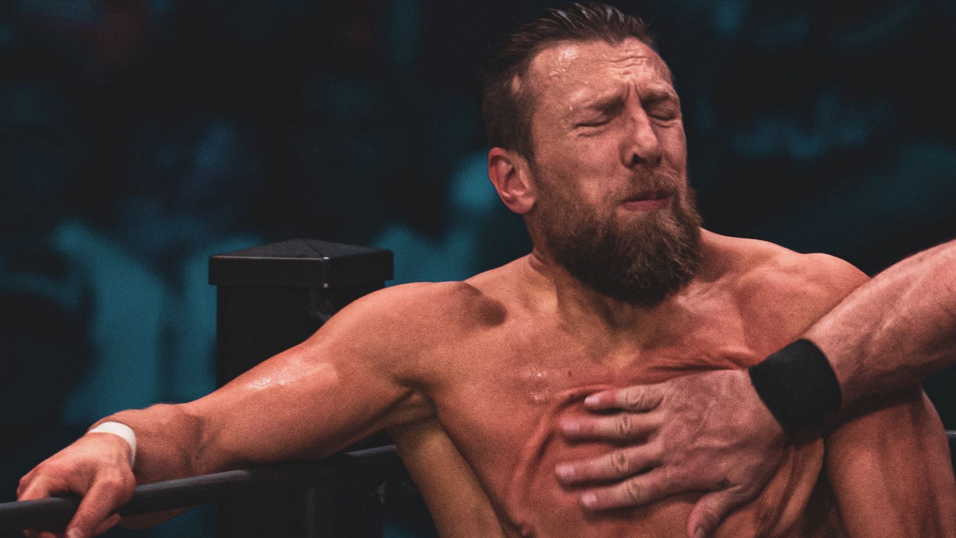 Bryan Danielson getting chopped by Jon Moxley at AEW Revolution 2022 (Credit: Jay Lee Photography)