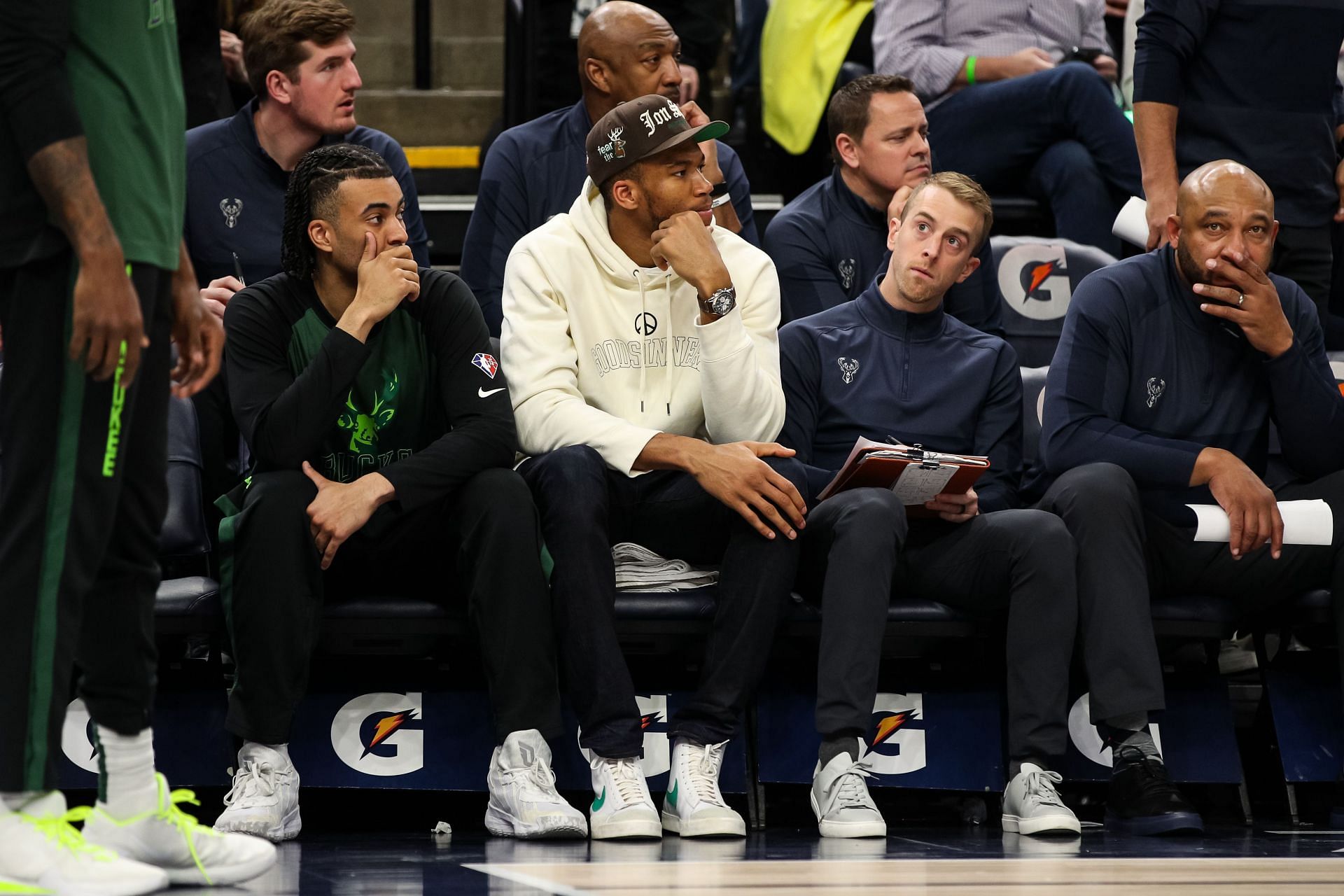 Giannis Antetokounmpo of the Milwaukee Bucks (C) looks on from the bench