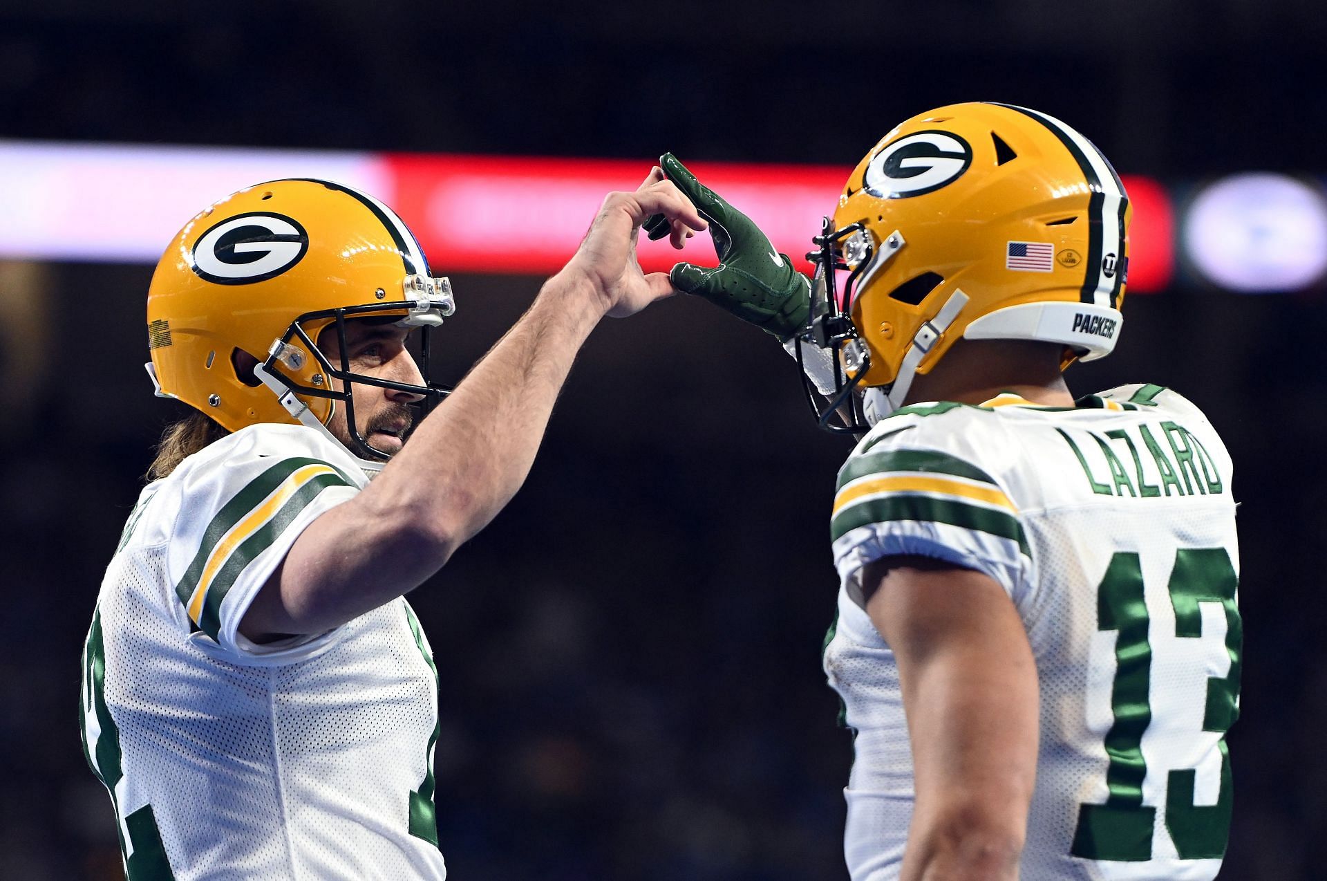 Aaron Rodgers and Allen Lazard celebrate a touchdown
