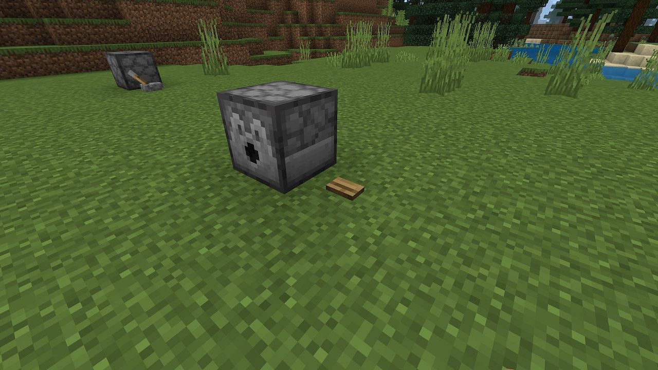Gamers can also use a button to activate the dispenser (Image via Minecraft)