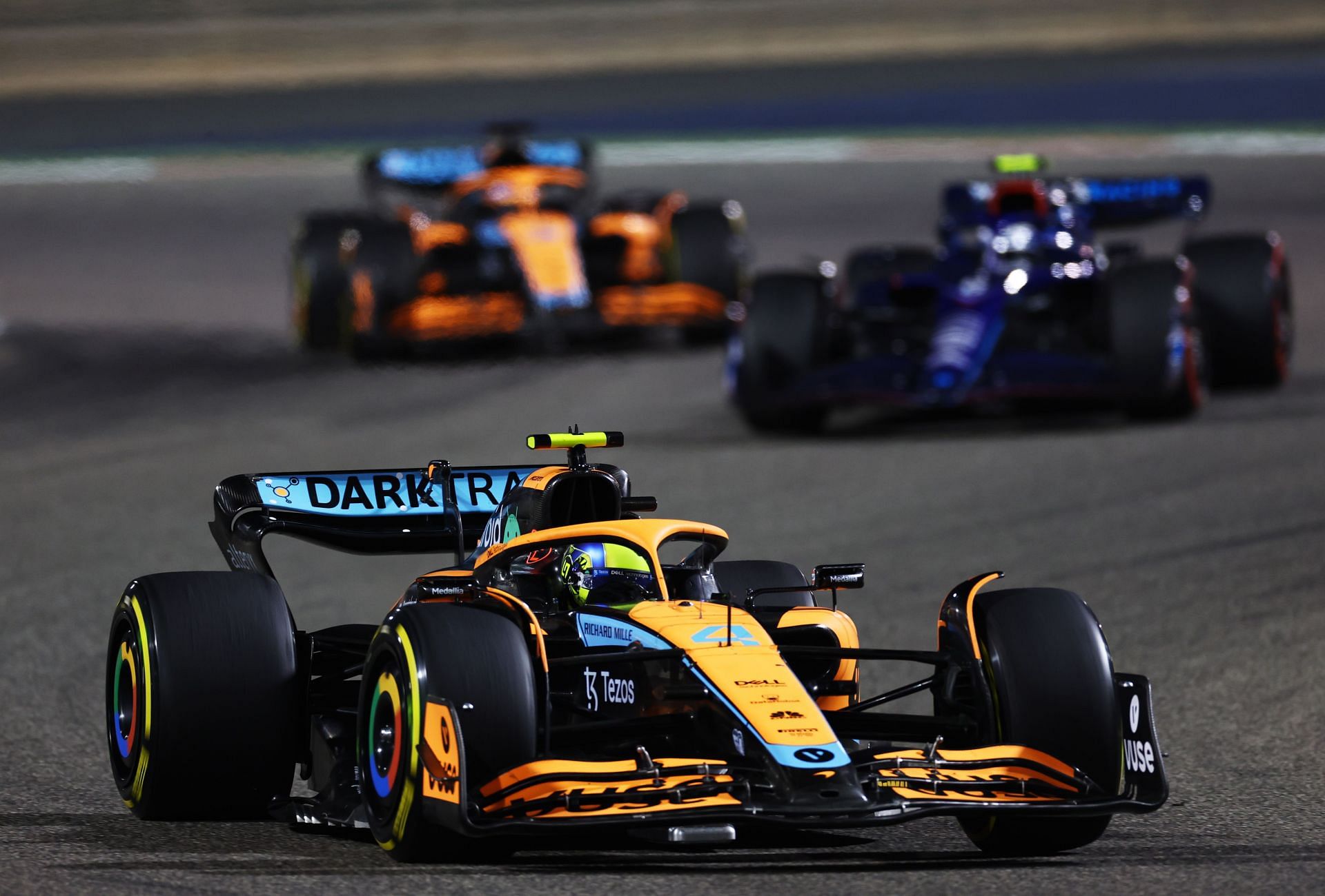 Lando Norris (#4) McLaren MCL36 leads Nicholas Latifi (#6) Williams FW44 at the 2022 Bahrain Grand Prix