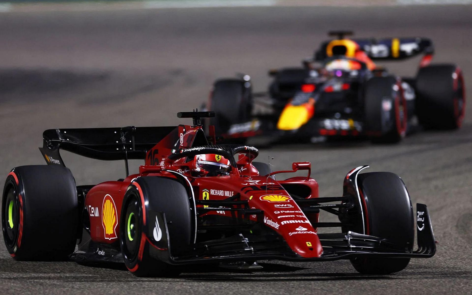 Charles Leclerc (#16) Scuderia Ferrari F1-75 leads Max Verstappen (#1) Red Bull Racing RB18 at the 2022 Bahrain Grand Prix