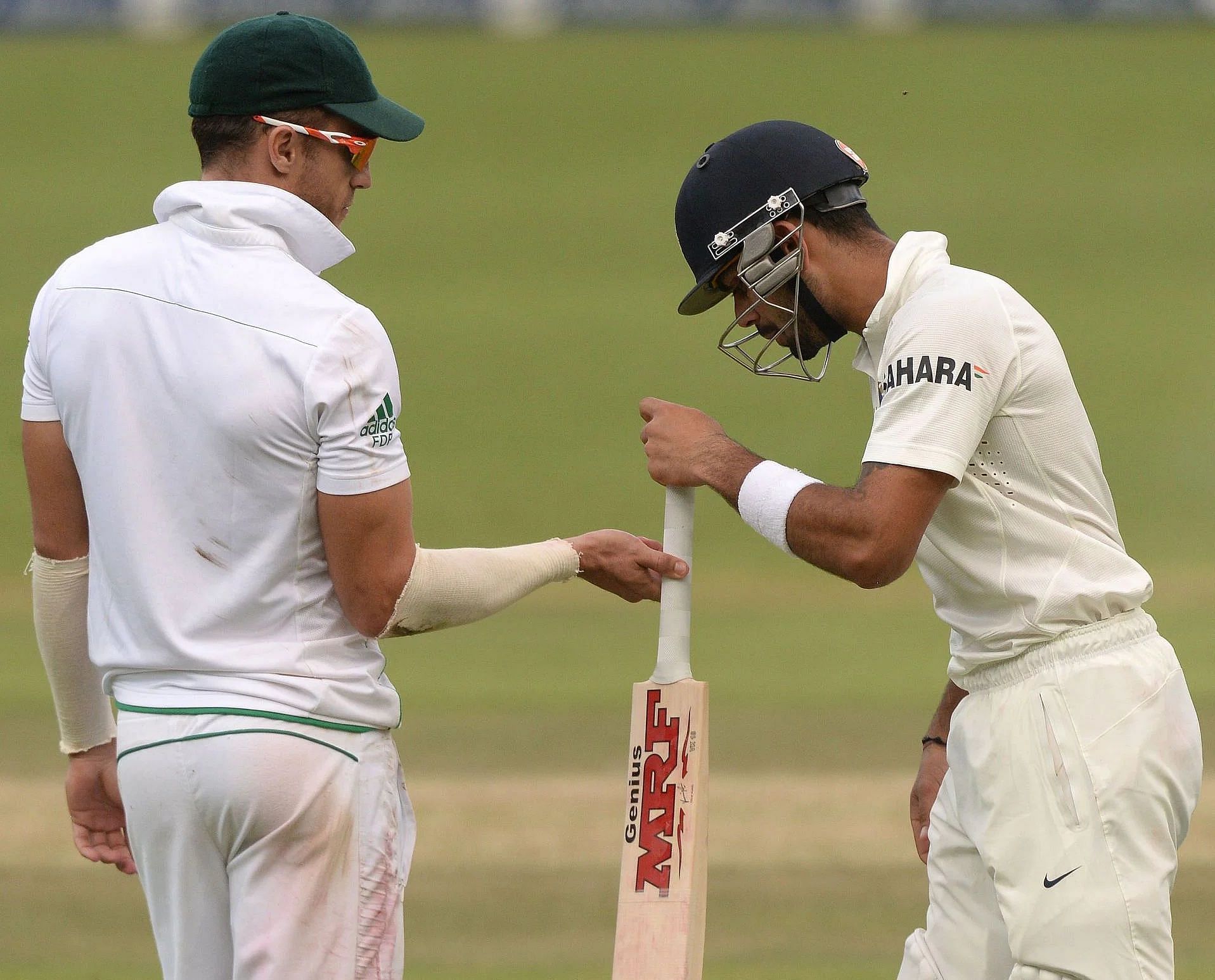 Faf du Plessis (left) and Virat Kohli during a Test match. Pic: Getty Images
