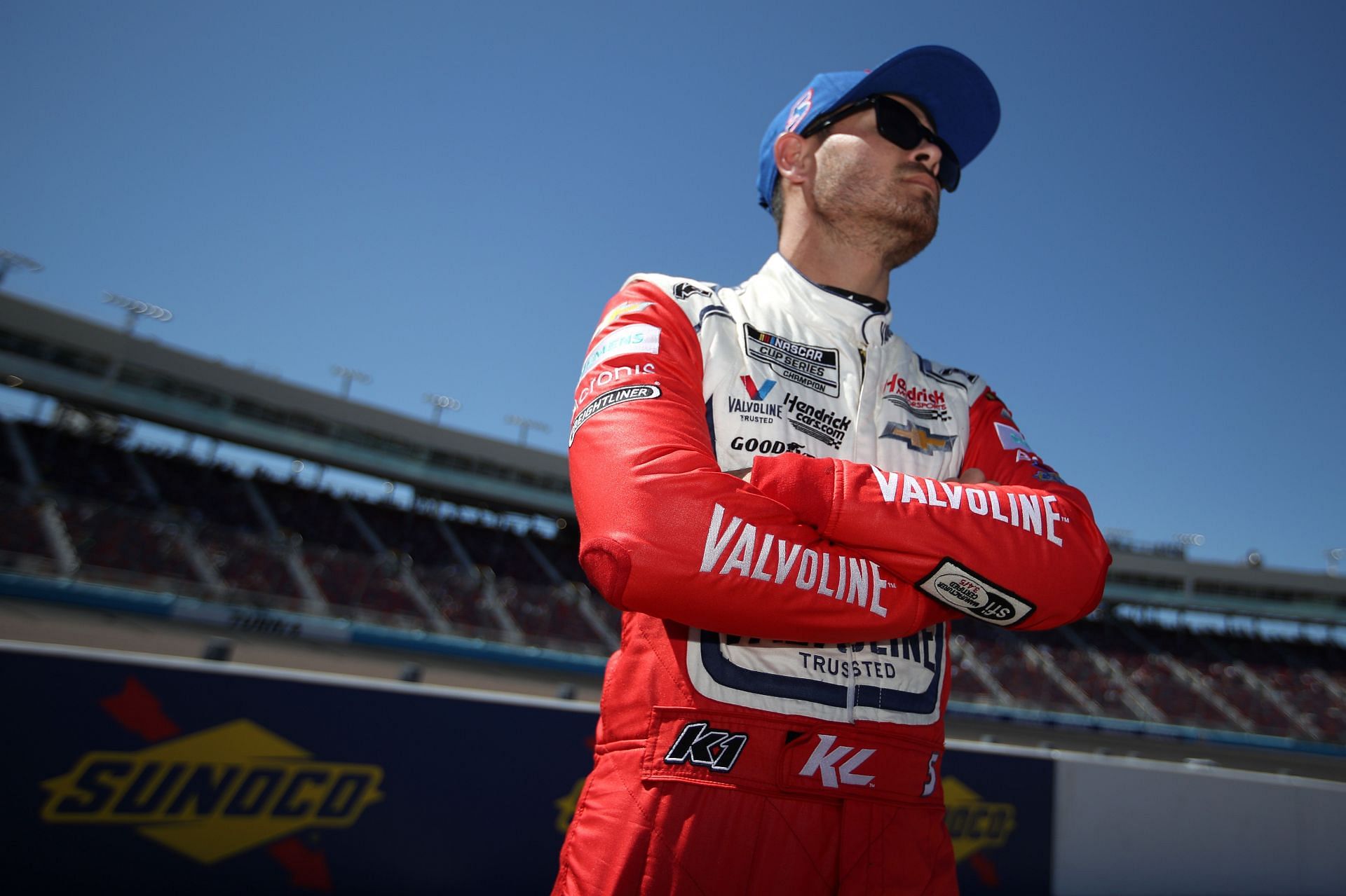 Kyle Larson looks on during qualifying for the Ruoff Mortgage 500 at Phoenix Raceway.