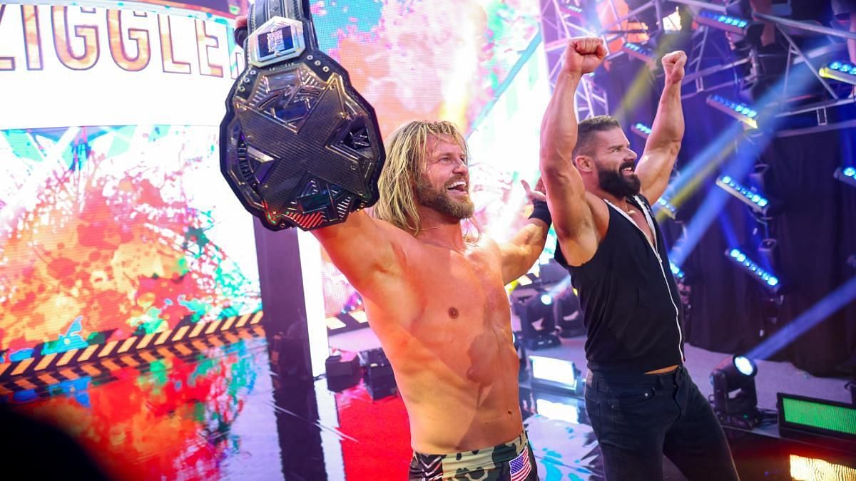 Dolph Ziggler celebrates winning the NXT Championship with Robert Roode.