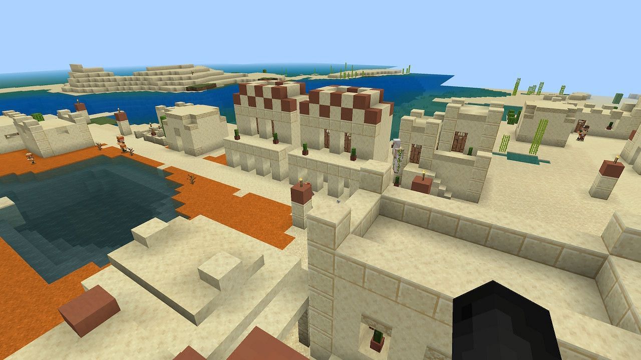 Players will spawn directly in this beautiful desert village (Image via Minecraft)