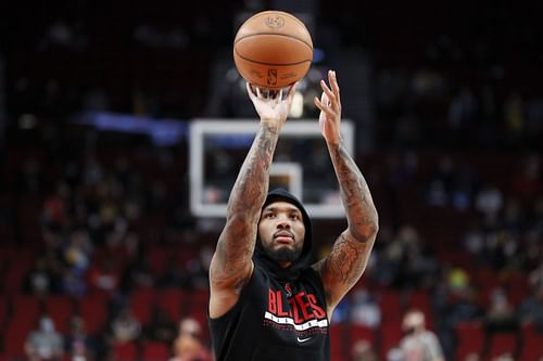 Damian Lillard #0 of the Portland Trail Blazers warms up before the game against the Los Angeles Lakers at Moda Center on February 09, 2022 in Portland, Oregon.