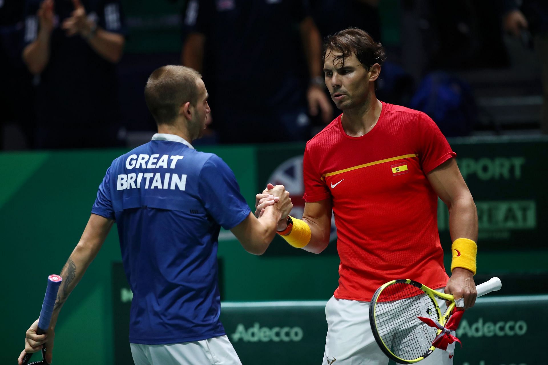 Great Britain&#039;s Dan Evans with Spain&#039;s Rafael Nadal
