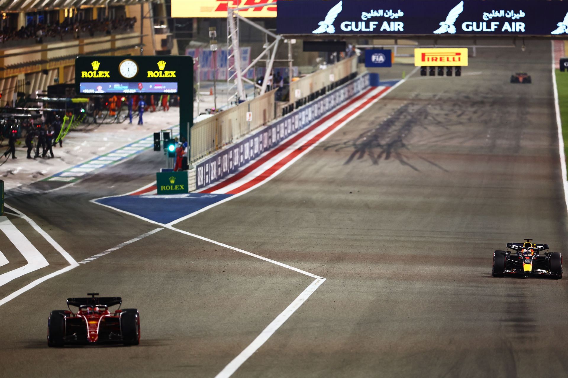 Red Bull&#039;s Max Verstappen missing opportunity to overtake Ferrari&#039;s Charles Leclerc as he exits pit lane at 2022 Bahrain Formula 1 Grand Prix (Image via Mark Thompson/Getty Images)