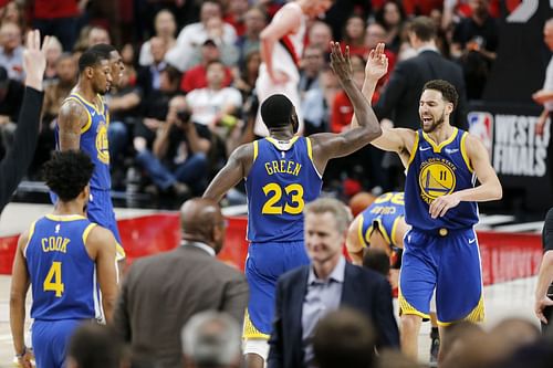 Draymond Green and Klay Thompson in action during a game