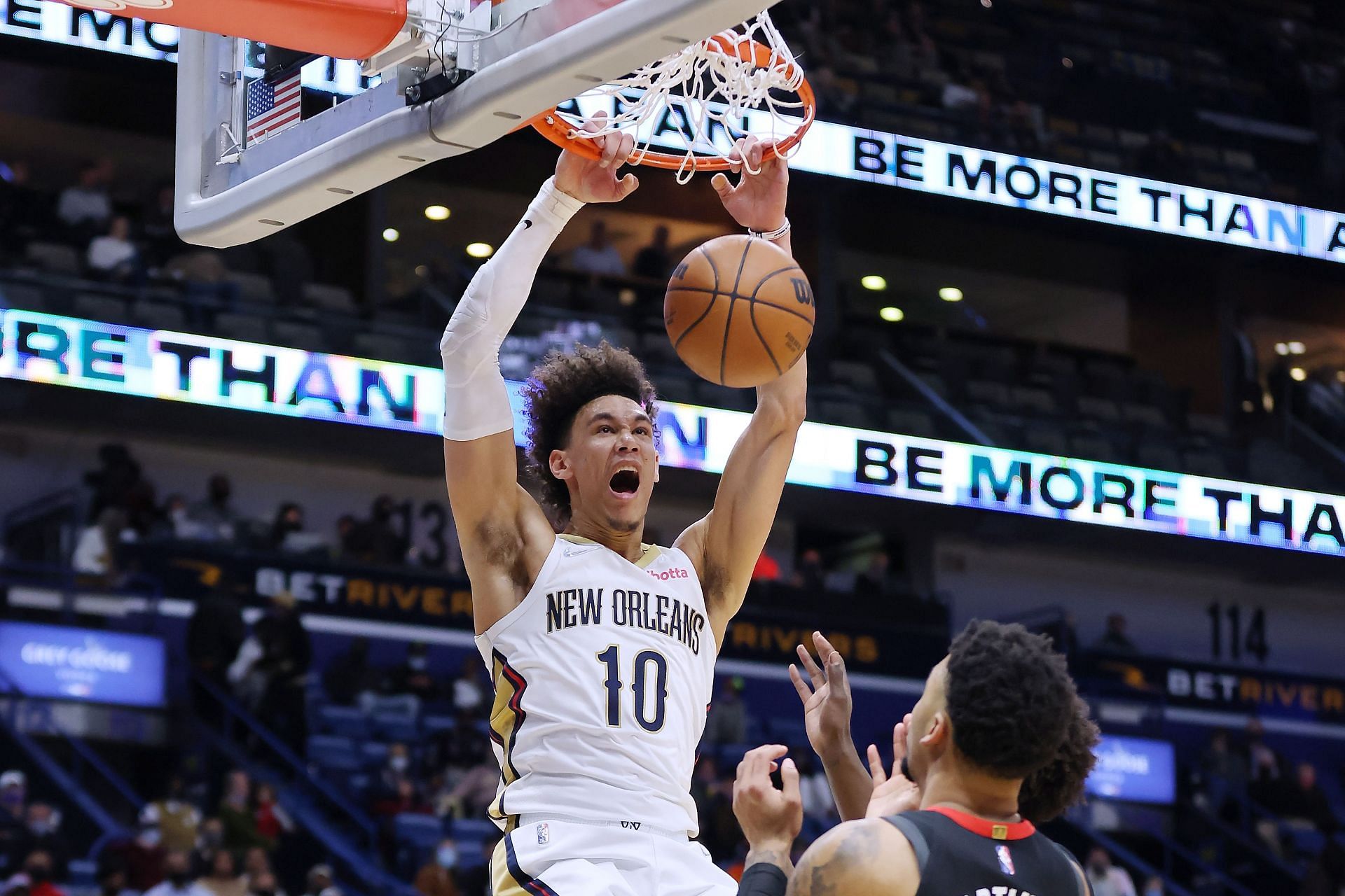 Jaxson Hayes of the New Orleans Pelicans dunks as Kenyon Martin Jr. of the Houston Rockets defends.