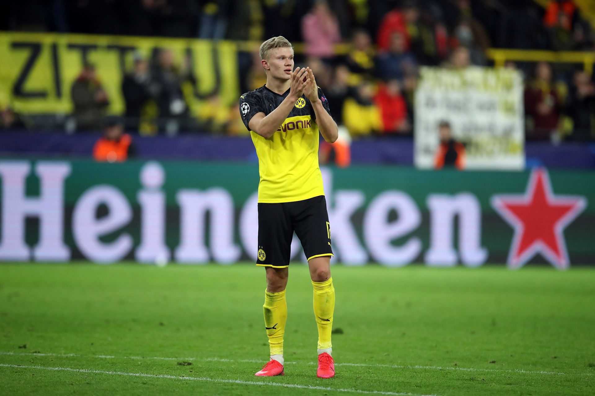 Erling Haaland applauds the Borussia Dortmund faithful.