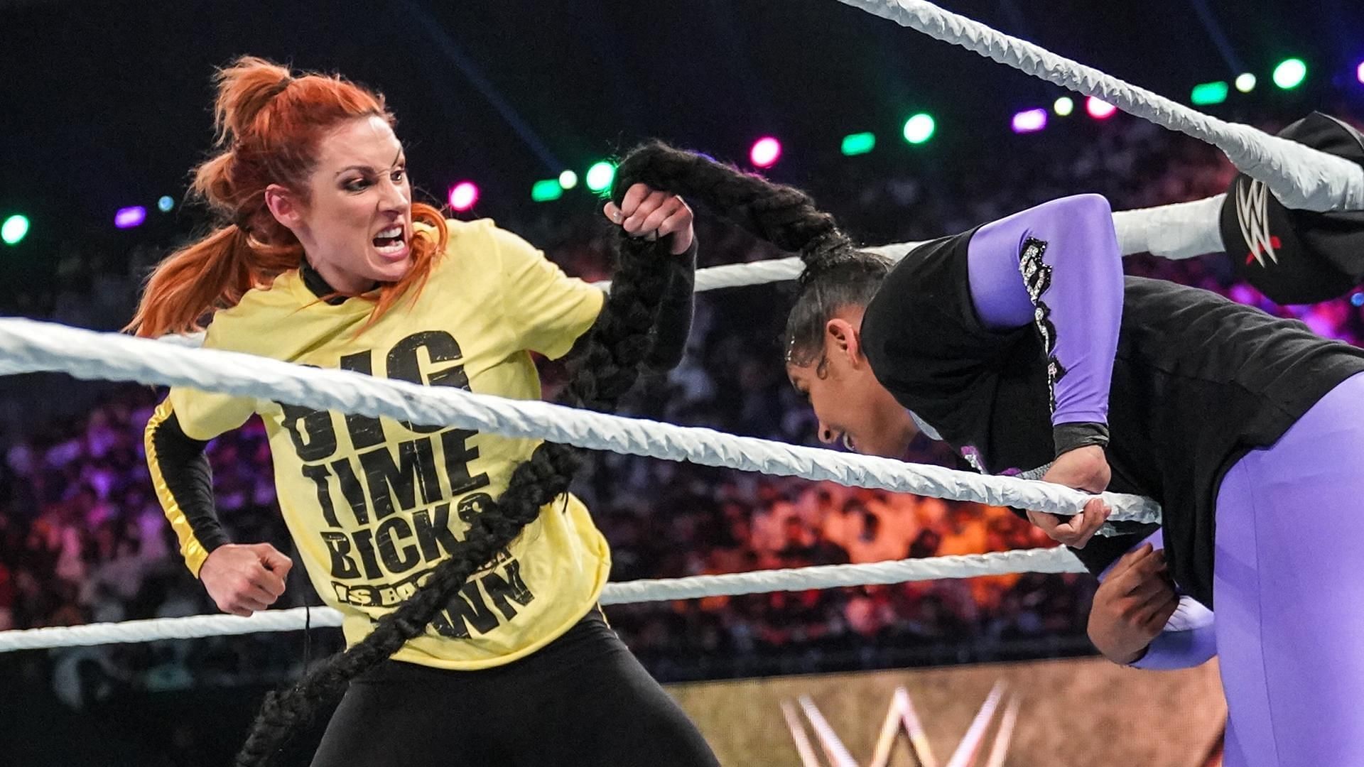 Becky Lynch attacking Bianca Belair at WWE Crown Jewel in 2021